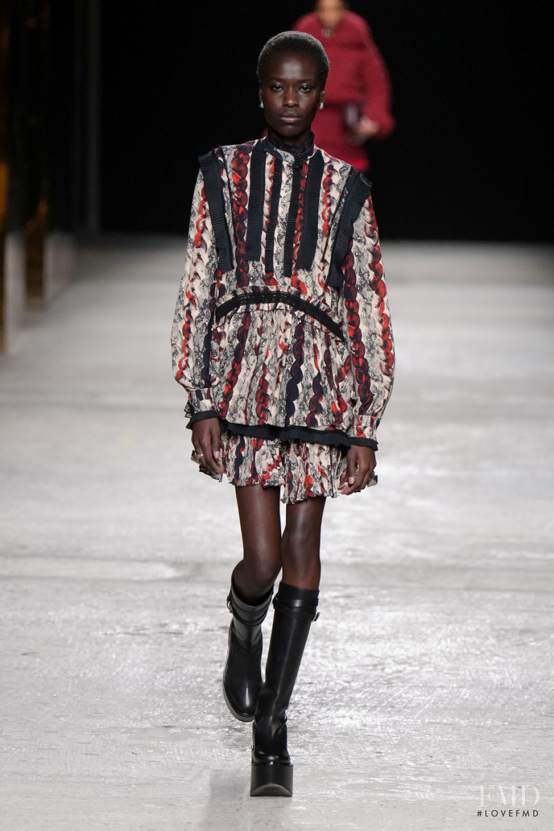 Awar Odhiang featured in  the Ports 1961 fashion show for Autumn/Winter 2022