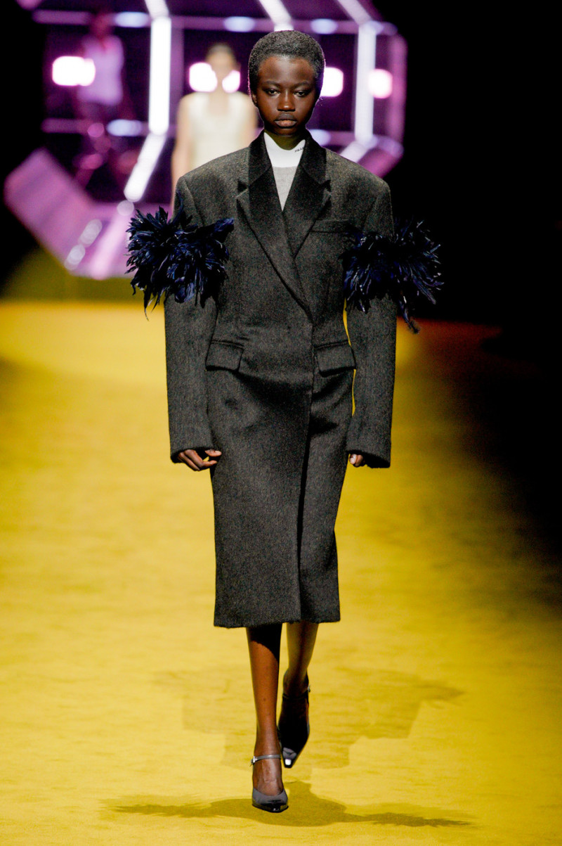 Anyiang Yak featured in  the Prada fashion show for Autumn/Winter 2022