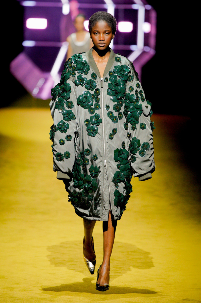 Tina Diedhiou featured in  the Prada fashion show for Autumn/Winter 2022