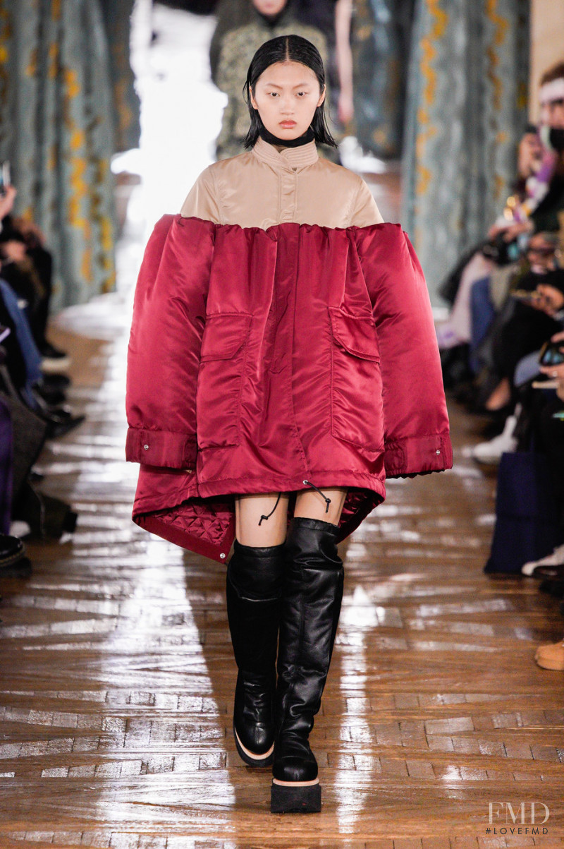 Yilan Hua featured in  the Sacai fashion show for Autumn/Winter 2022
