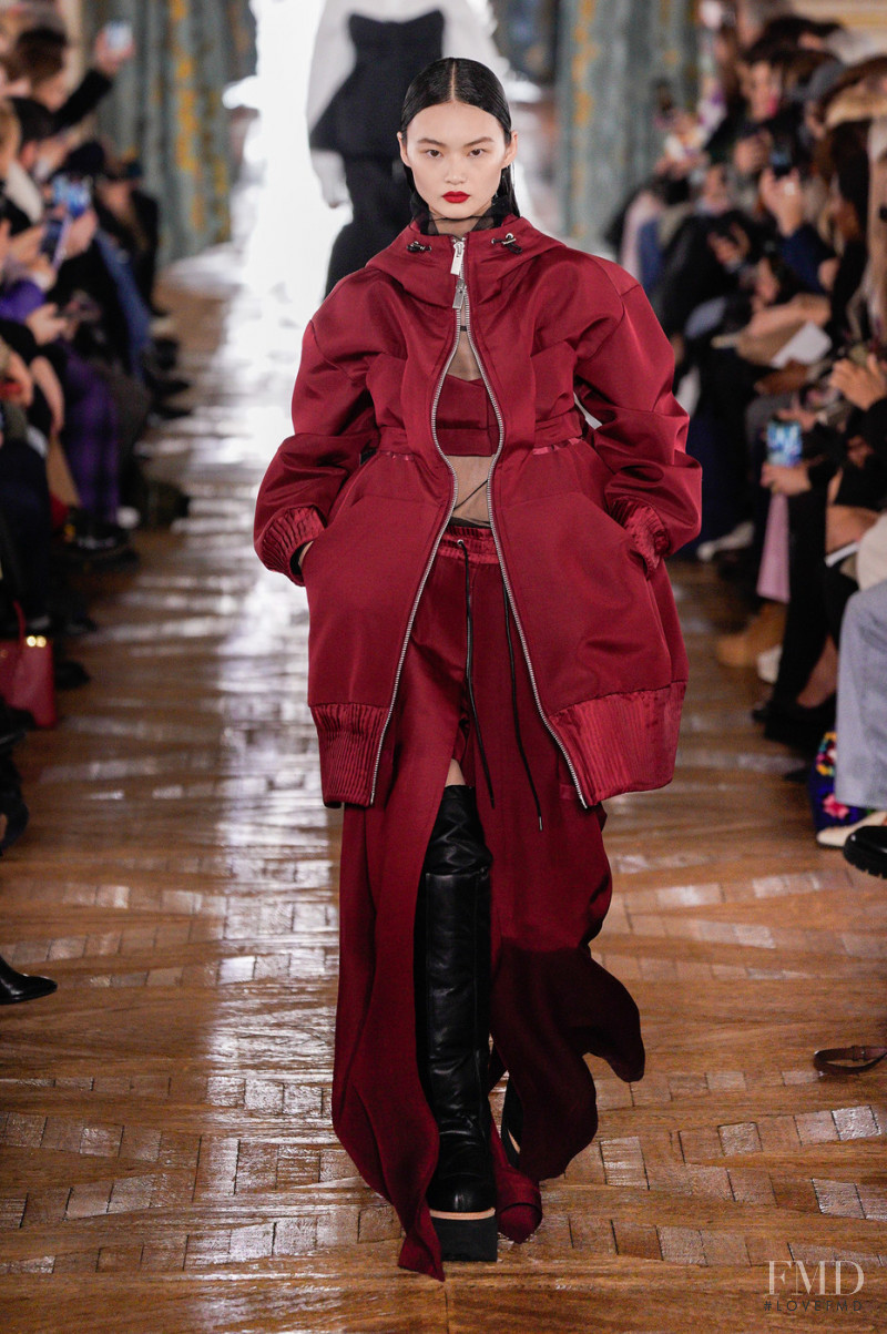 Cong He featured in  the Sacai fashion show for Autumn/Winter 2022