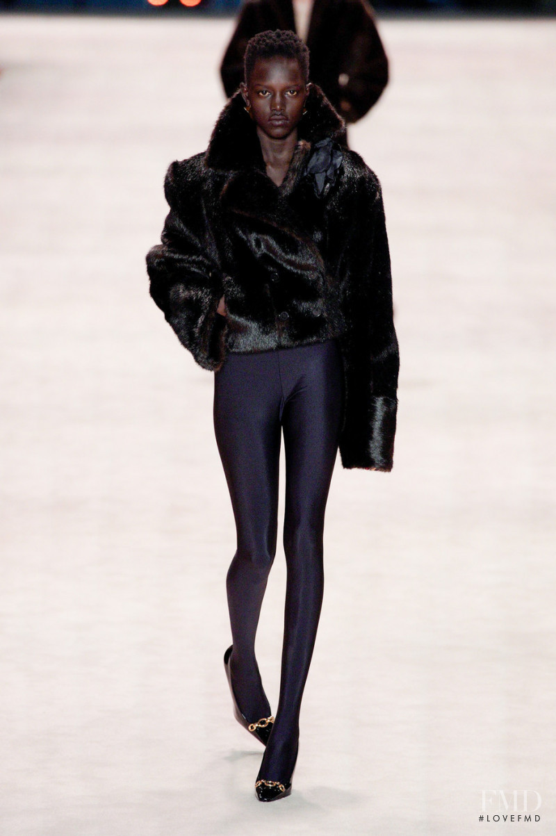 Alaato Jazyper featured in  the Saint Laurent fashion show for Autumn/Winter 2022