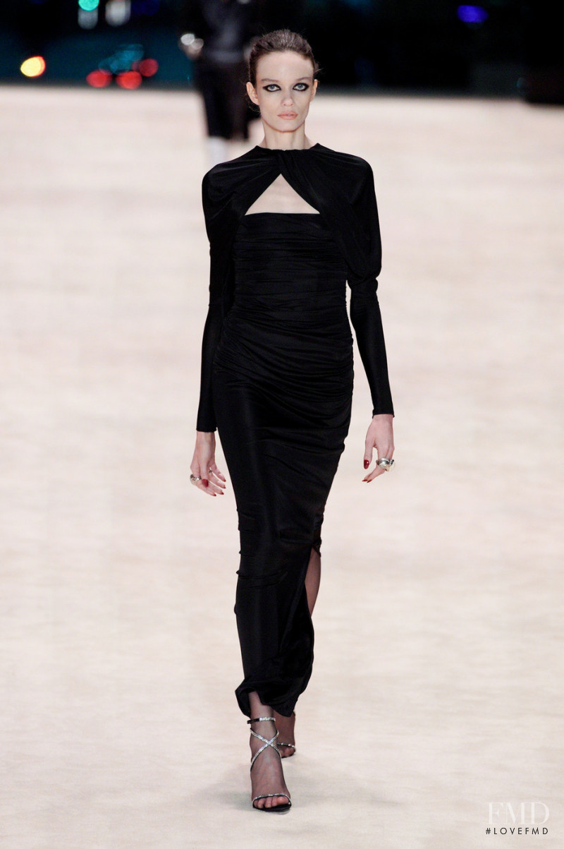 Megan Miles featured in  the Saint Laurent fashion show for Autumn/Winter 2022