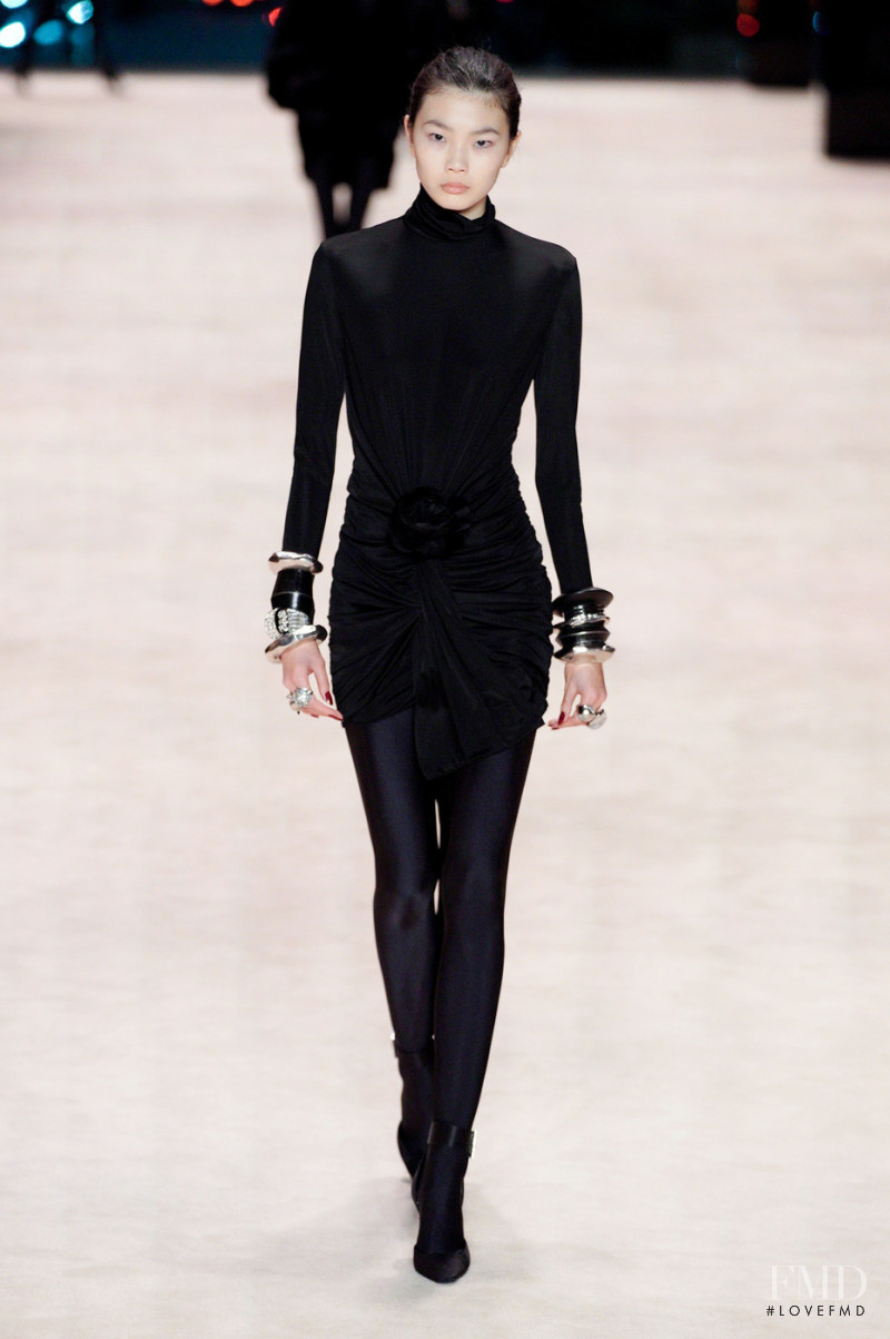 Sherry Shi featured in  the Saint Laurent fashion show for Autumn/Winter 2022