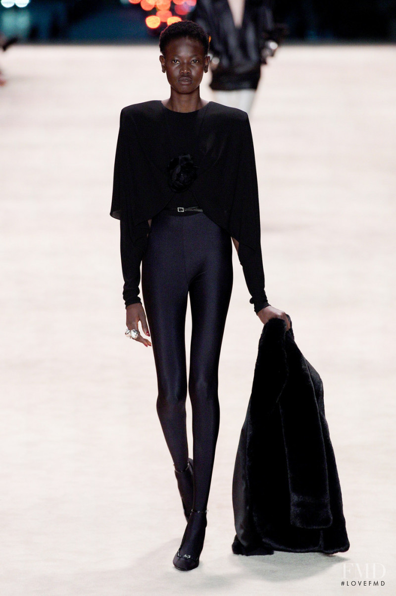 Awek Gak featured in  the Saint Laurent fashion show for Autumn/Winter 2022