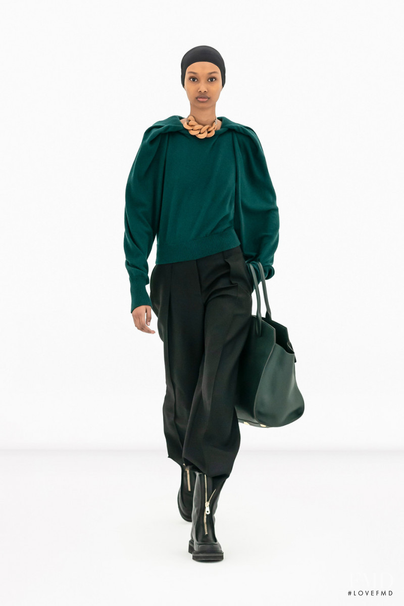 Ugbad Abdi featured in  the Salvatore Ferragamo fashion show for Autumn/Winter 2022