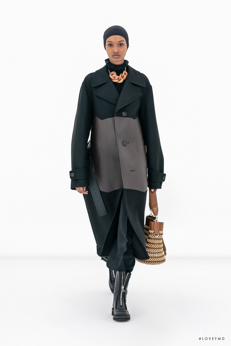 Ugbad Abdi featured in  the Salvatore Ferragamo fashion show for Autumn/Winter 2022