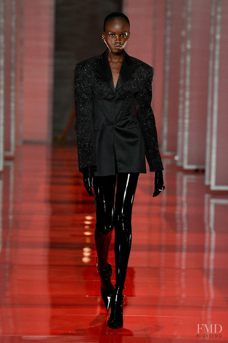 Anyier Anei featured in  the Versace fashion show for Autumn/Winter 2022