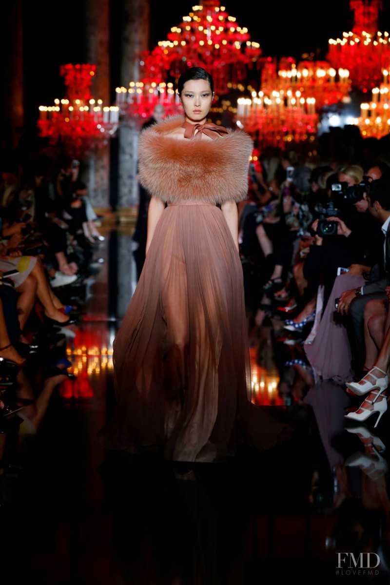 Sung Hee Kim featured in  the Elie Saab Couture fashion show for Autumn/Winter 2014