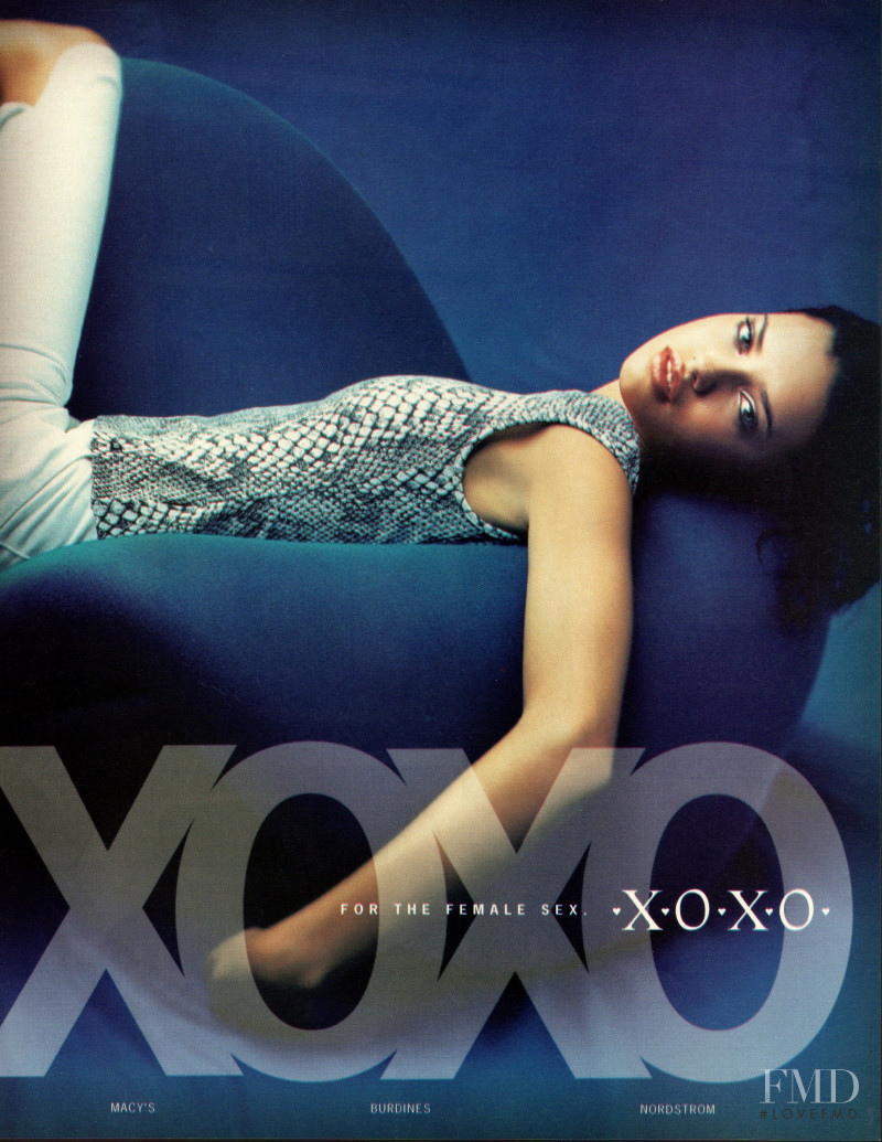 Adriana Lima featured in  the XOXO advertisement for Autumn/Winter 1999