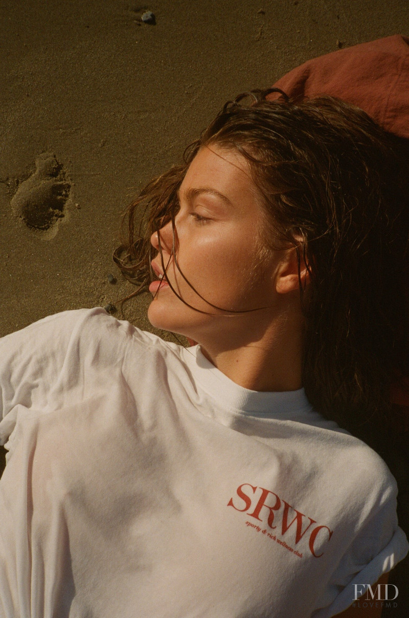 Luna Bijl featured in  the Sporty & Rich advertisement for Spring/Summer 2022