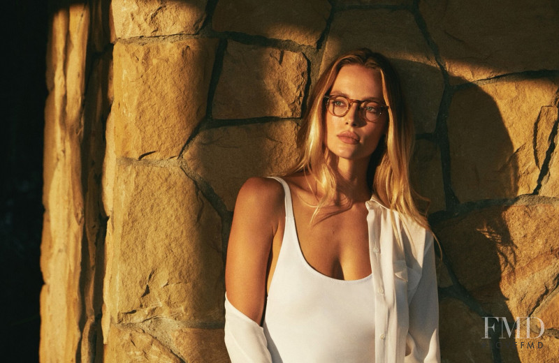 Hannah Ferguson featured in  the Oliver Peoples advertisement for Spring/Summer 2021