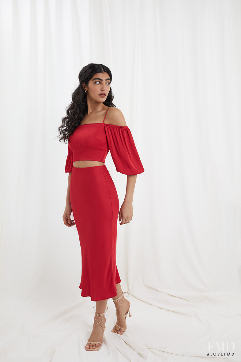 Soulin Omar featured in  the Nola London catalogue for Summer 2022