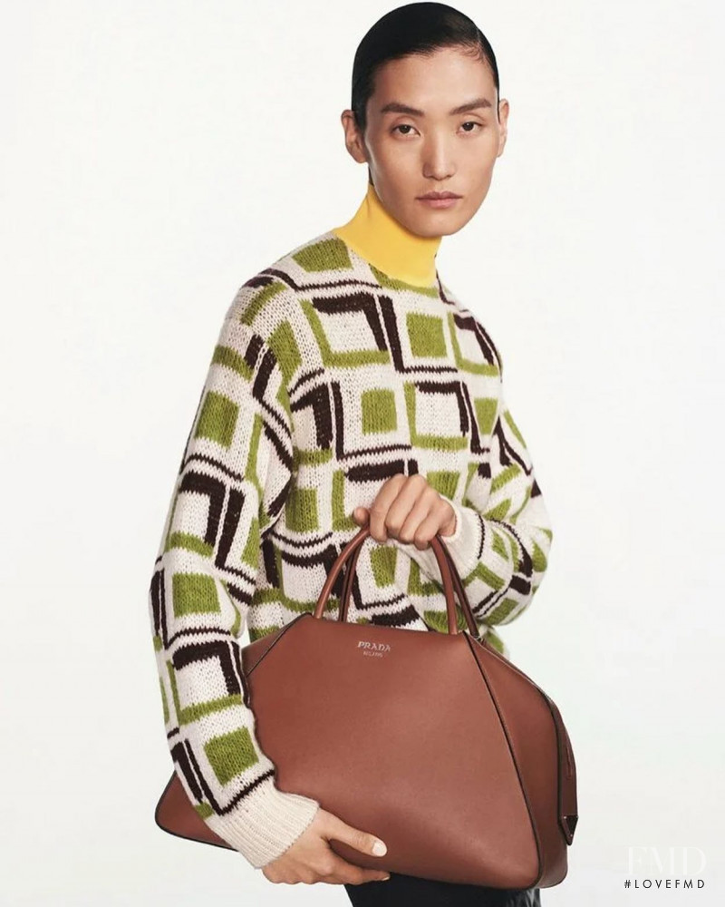 Lina Zhang featured in  the Prada advertisement for Autumn/Winter 2022