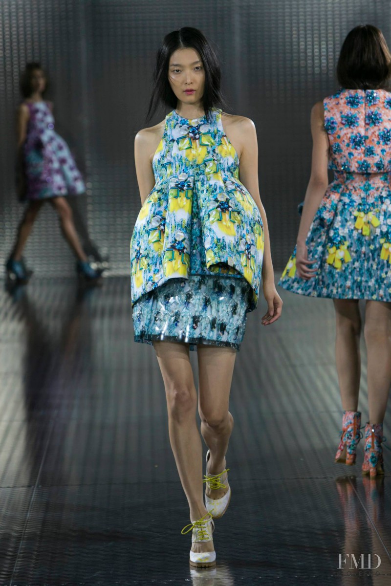 Sung Hee Kim featured in  the Mary Katrantzou fashion show for Spring/Summer 2014