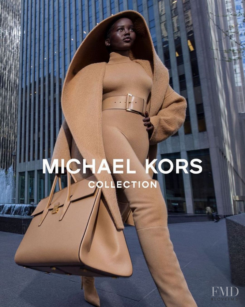 Adut Akech Bior featured in  the Michael Kors Collection advertisement for Autumn/Winter 2022