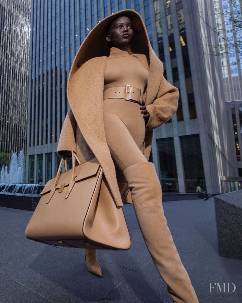 Adut Akech Bior featured in  the Michael Kors Collection advertisement for Autumn/Winter 2022