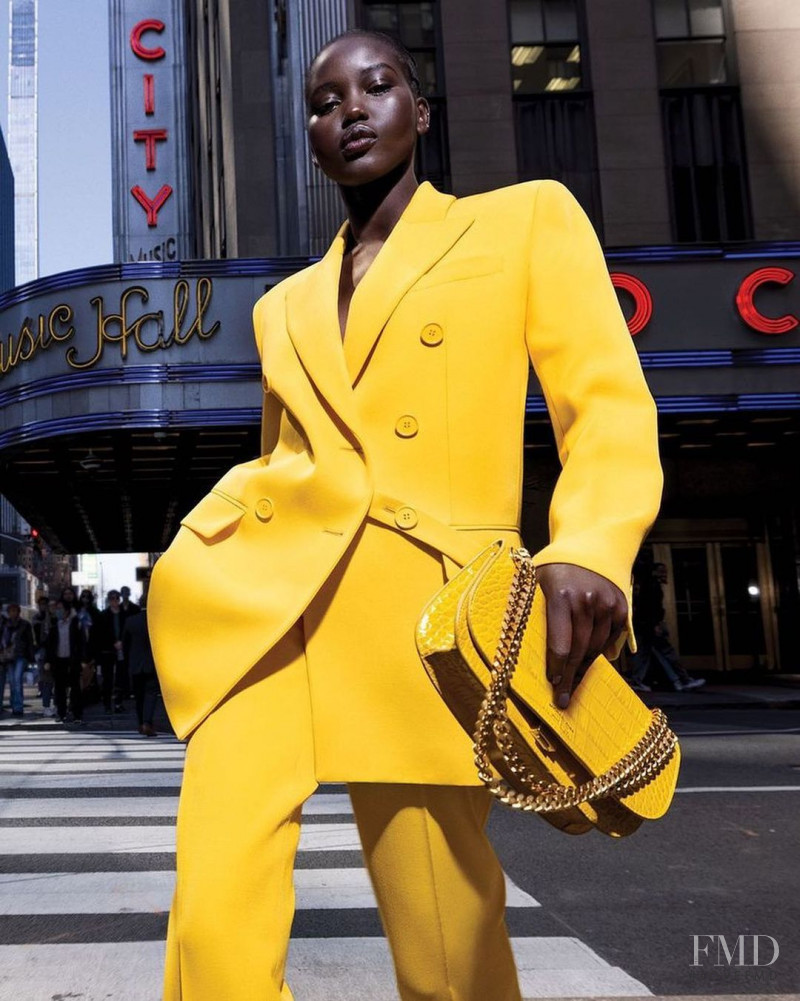 Adut Akech Bior featured in  the Michael Kors Collection advertisement for Autumn/Winter 2022