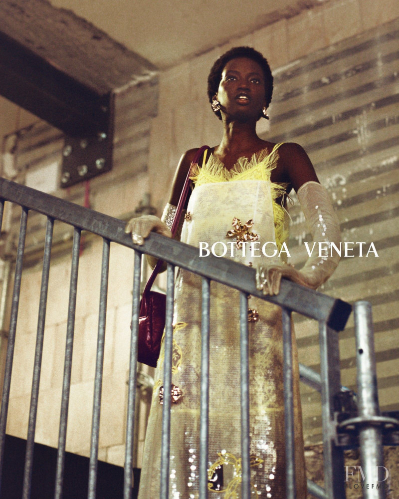 Anok Yai featured in  the Bottega Veneta advertisement for Autumn/Winter 2022