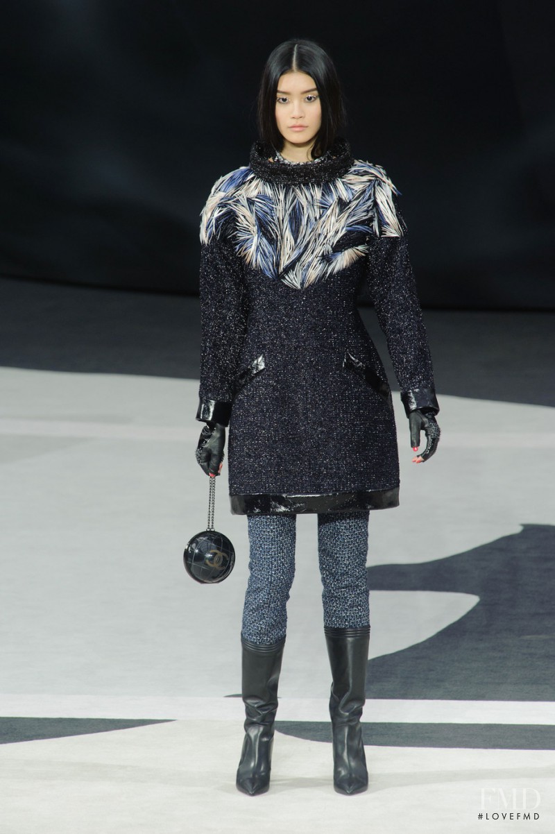 Ming Xi featured in  the Chanel fashion show for Autumn/Winter 2013