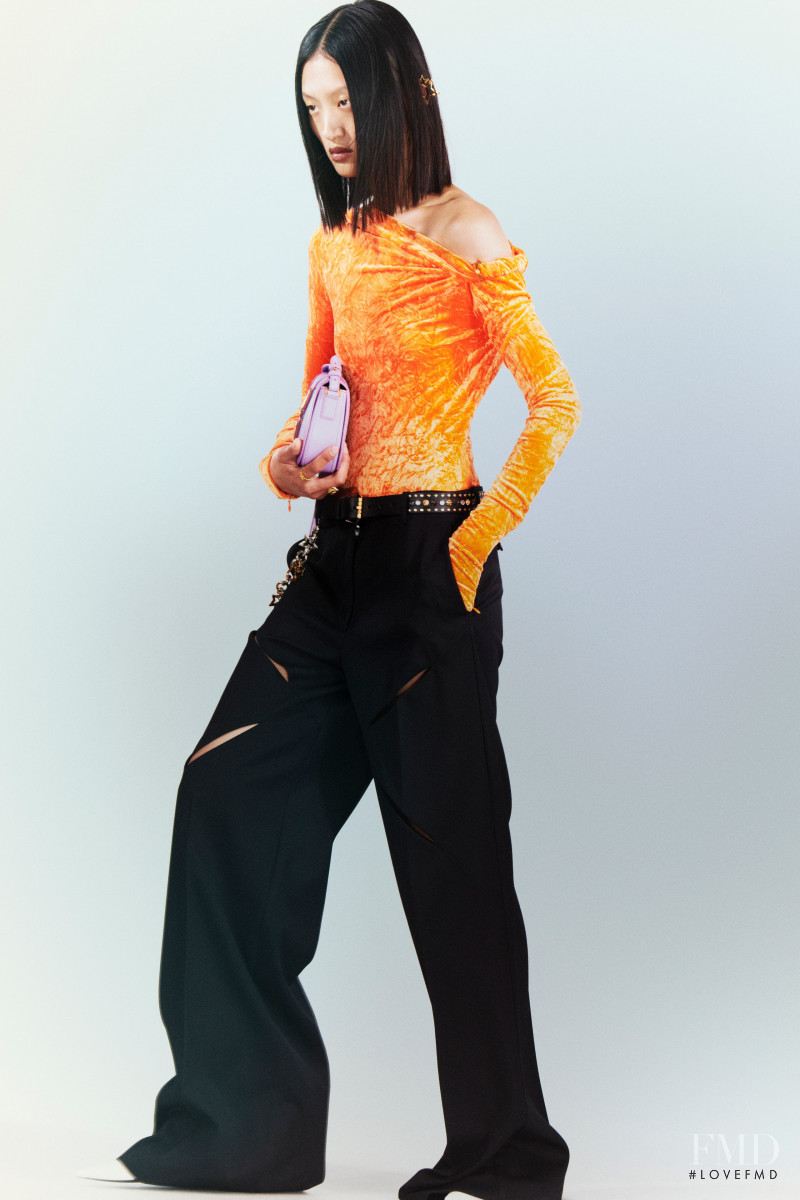 Yilan Hua featured in  the Versace lookbook for Resort 2023