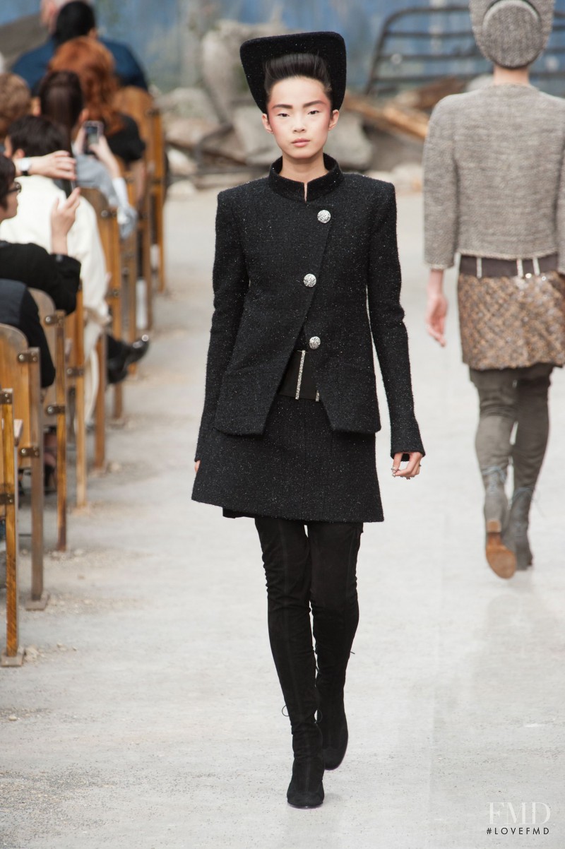 Xiao Wen Ju featured in  the Chanel Haute Couture fashion show for Autumn/Winter 2013