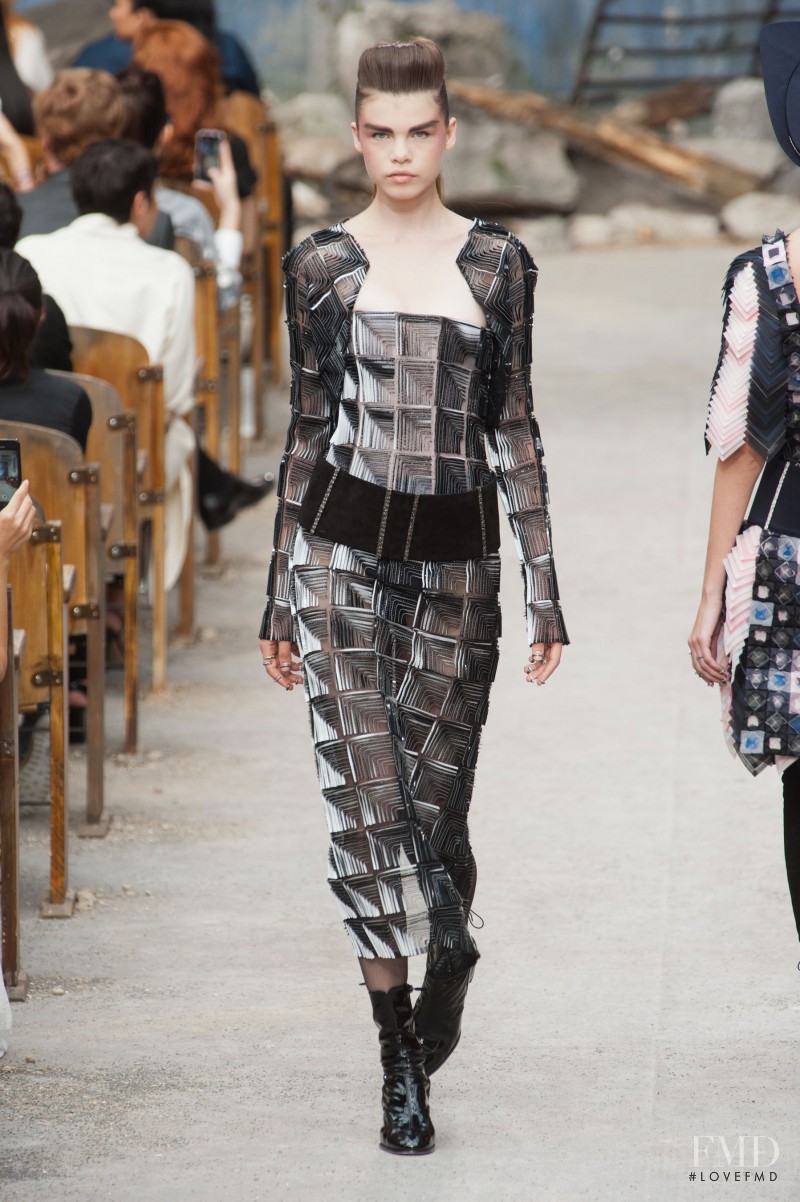 Olga Timokhina featured in  the Chanel Haute Couture fashion show for Autumn/Winter 2013