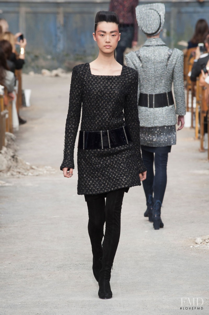 Tian Yi featured in  the Chanel Haute Couture fashion show for Autumn/Winter 2013