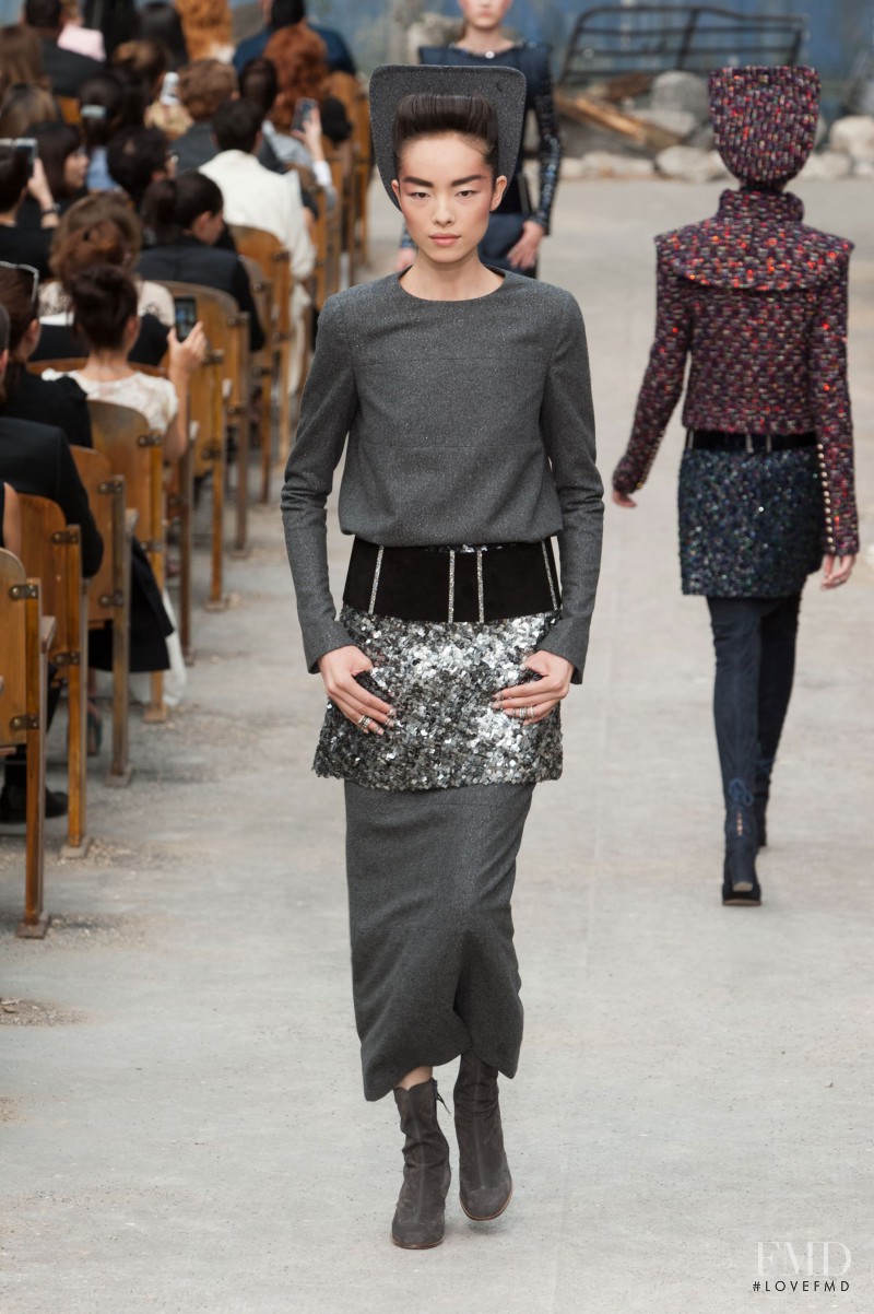 Fei Fei Sun featured in  the Chanel Haute Couture fashion show for Autumn/Winter 2013