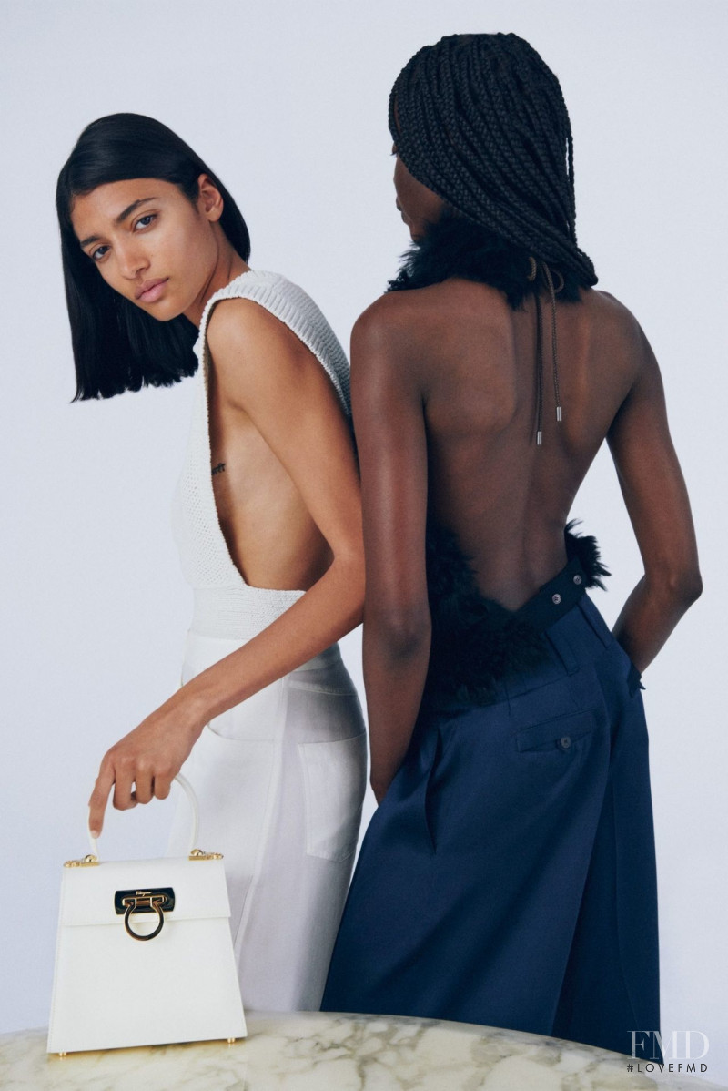 Achan Biong featured in  the Salvatore Ferragamo Top Handle Bag advertisement for Spring/Summer 2022