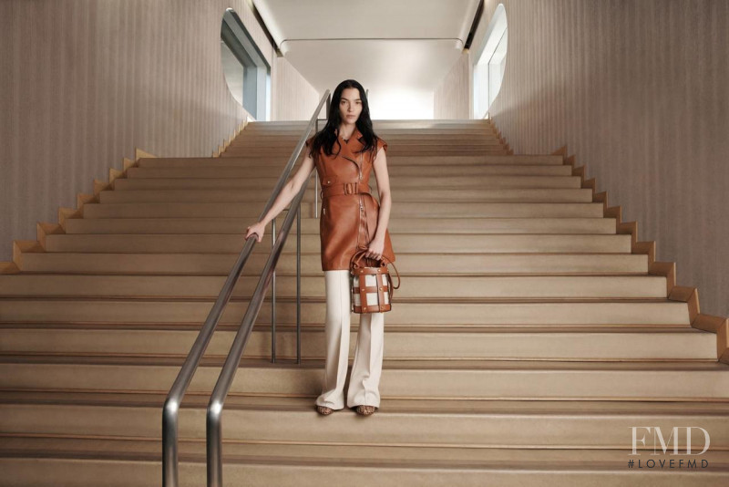 Mariacarla Boscono featured in  the Salvatore Ferragamo Cage Bag advertisement for Spring 2022