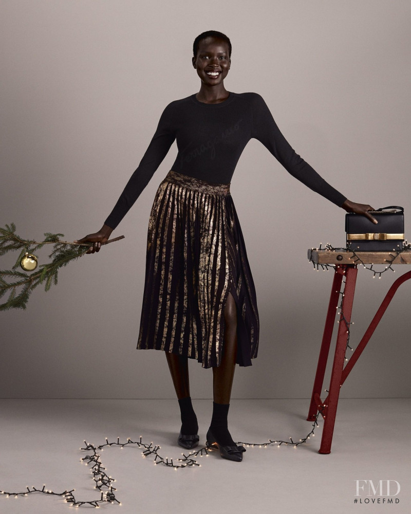 Ajok Madel featured in  the Salvatore Ferragamo advertisement for Holiday 2020