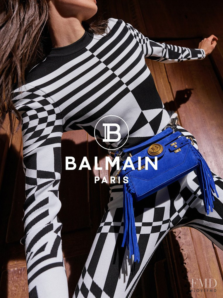 Africa Penalver featured in  the Balmain Accessories advertisement for Spring/Summer 2020
