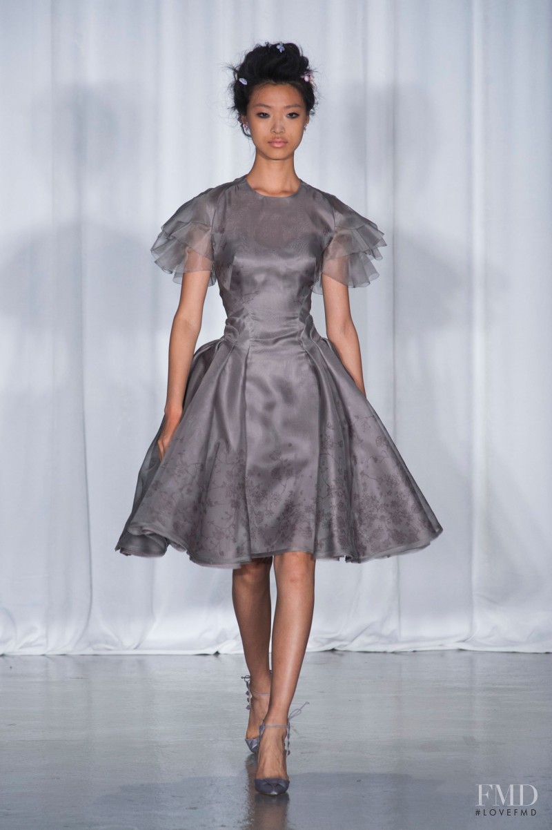 Tian Yi featured in  the Zac Posen fashion show for Spring/Summer 2014