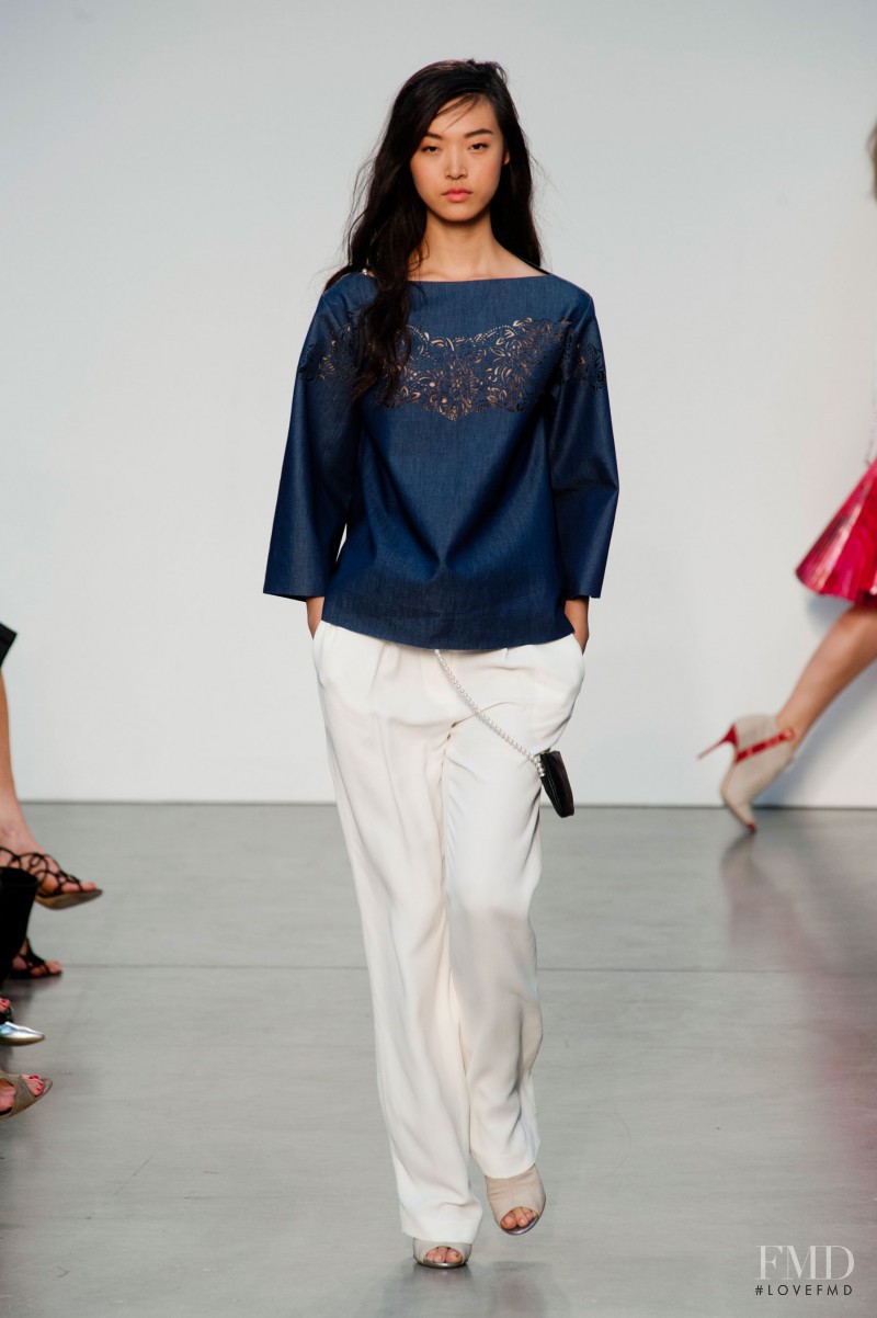 Tian Yi featured in  the Thakoon fashion show for Spring/Summer 2014