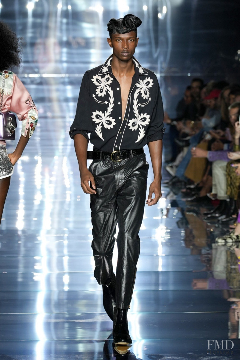Malik Anderson featured in  the Tom Ford fashion show for Spring/Summer 2023