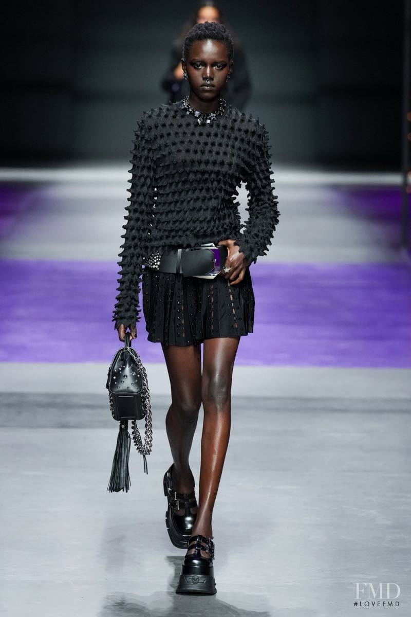 Alaato Jazyper featured in  the Versace fashion show for Spring/Summer 2023