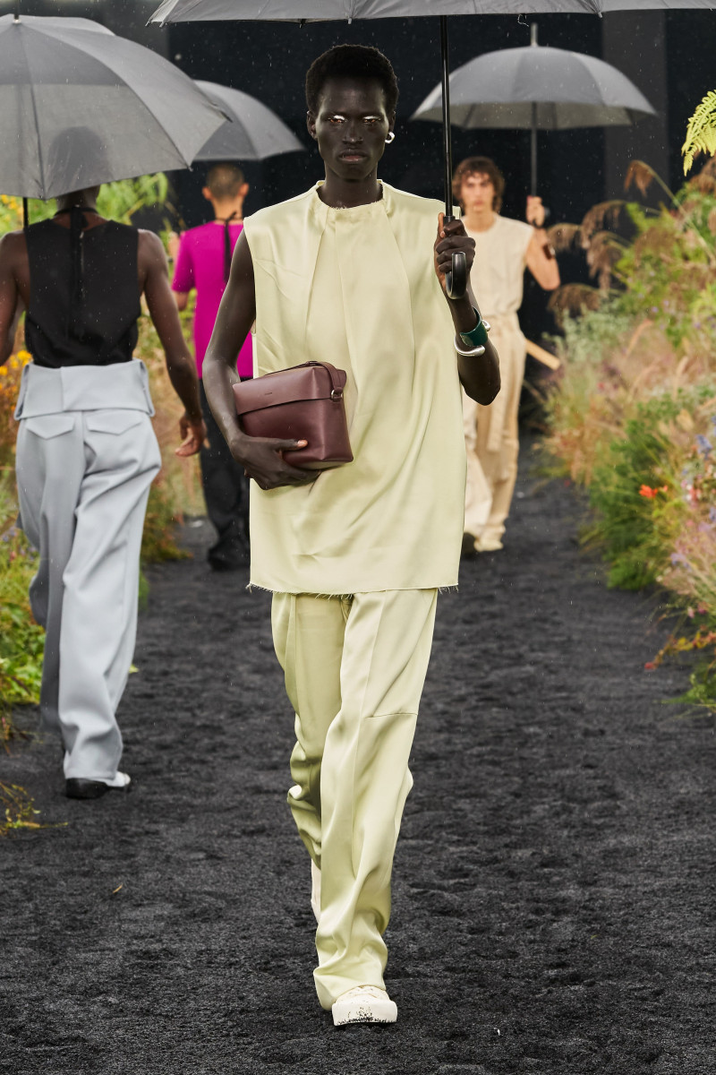 Mamuor Awak Majeng featured in  the Jil Sander fashion show for Spring/Summer 2023