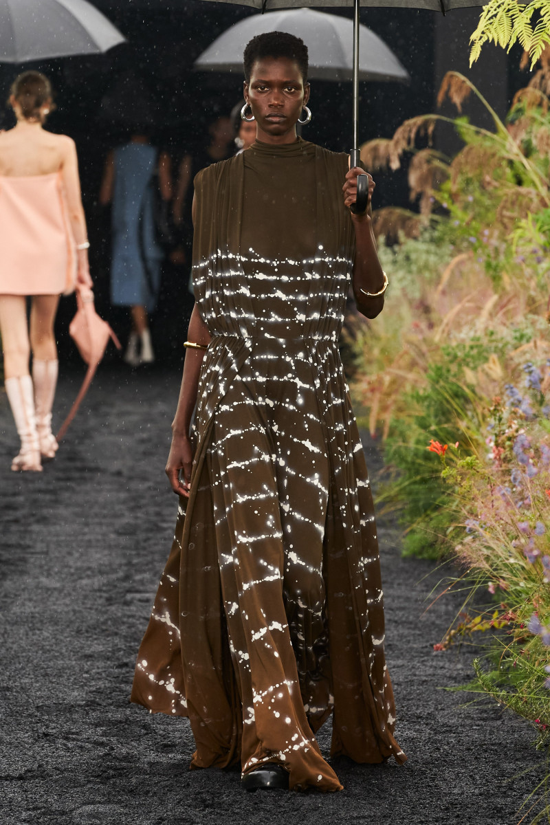 Ajah Angau Jok featured in  the Jil Sander fashion show for Spring/Summer 2023