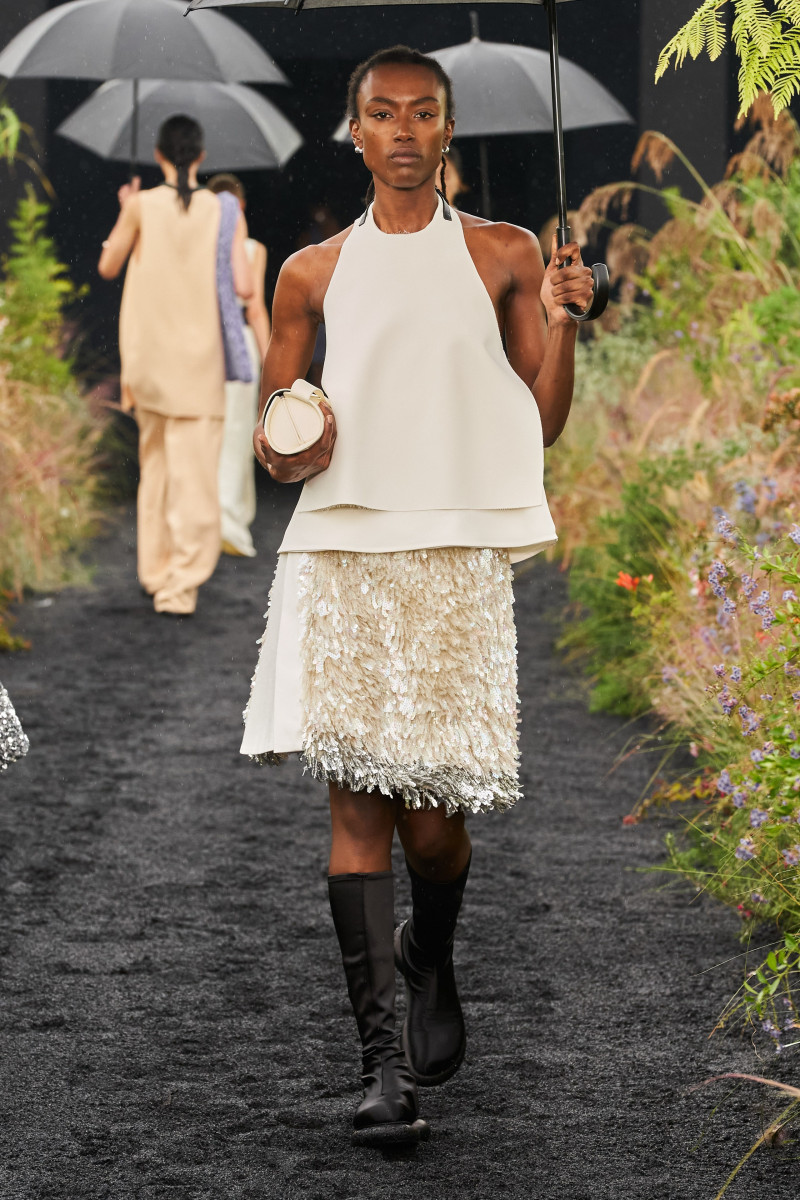 Amelie Nsengiyumva featured in  the Jil Sander fashion show for Spring/Summer 2023