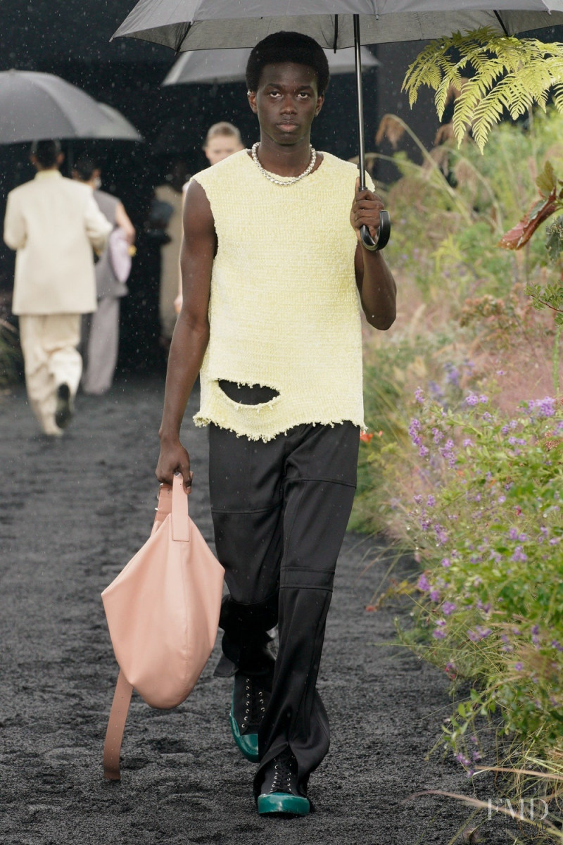 Ibrahima Alessio featured in  the Jil Sander fashion show for Spring/Summer 2023