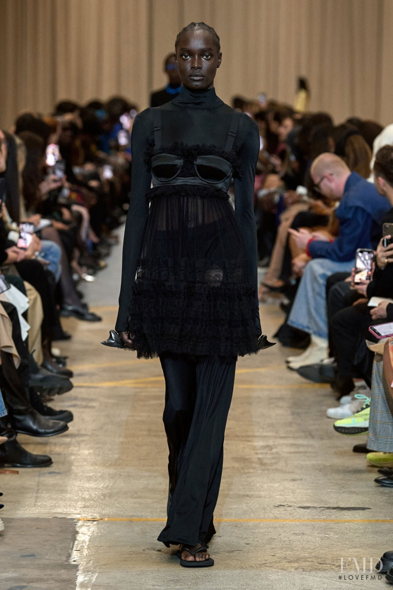 Ayuol Manyok featured in  the Burberry fashion show for Spring/Summer 2023