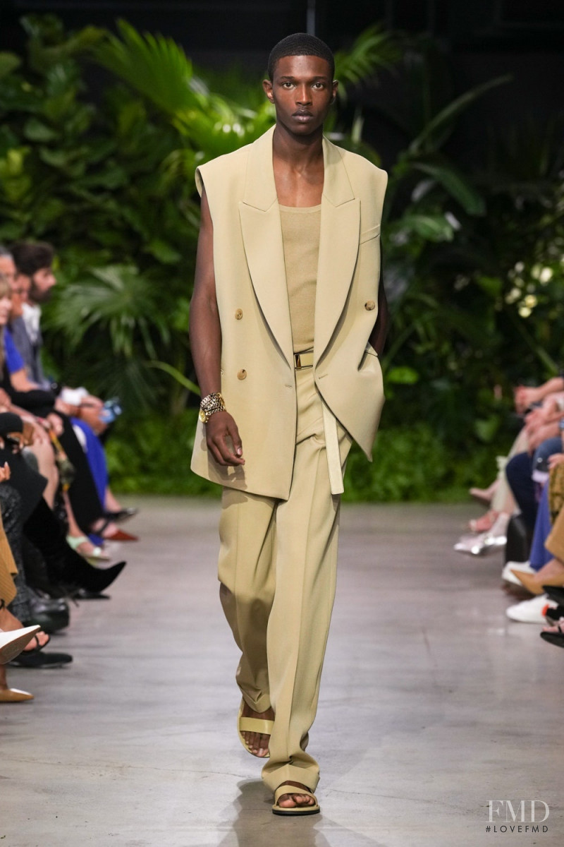 Malik Anderson featured in  the Michael Kors Collection fashion show for Spring/Summer 2023