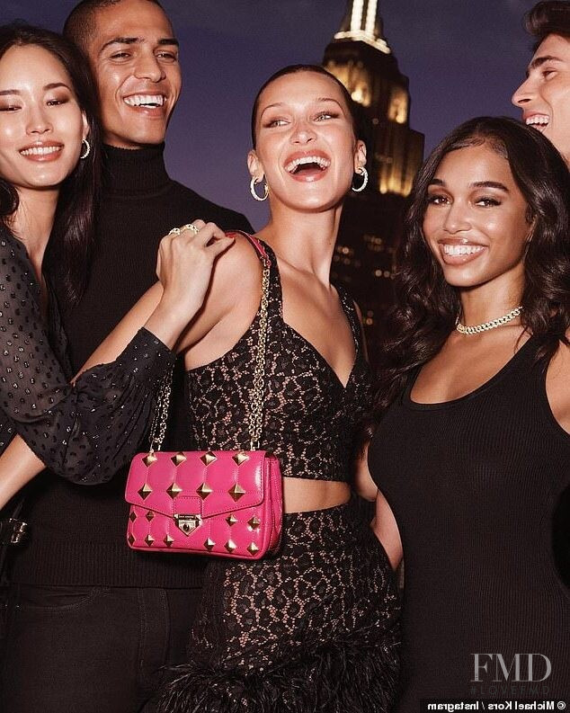 Bella Hadid featured in  the Michael Kors Collection MK Soho advertisement for Holiday 2021