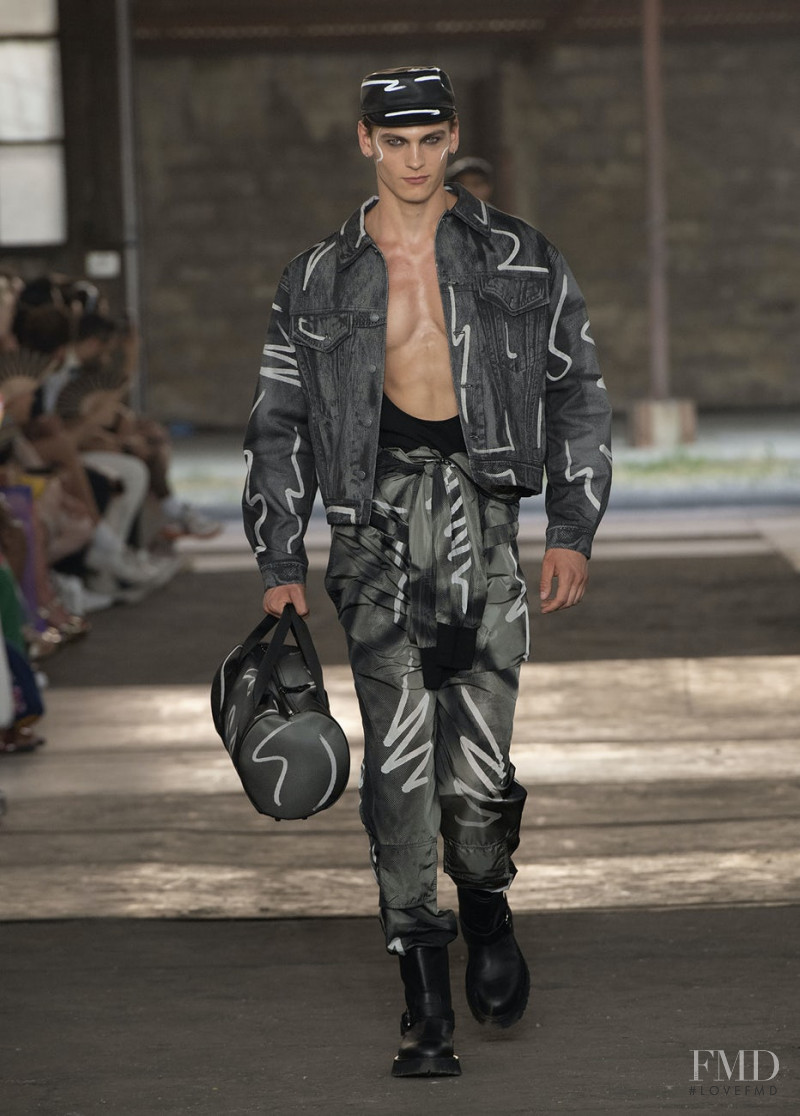 Lucas Barski featured in  the Moschino fashion show for Spring/Summer 2023