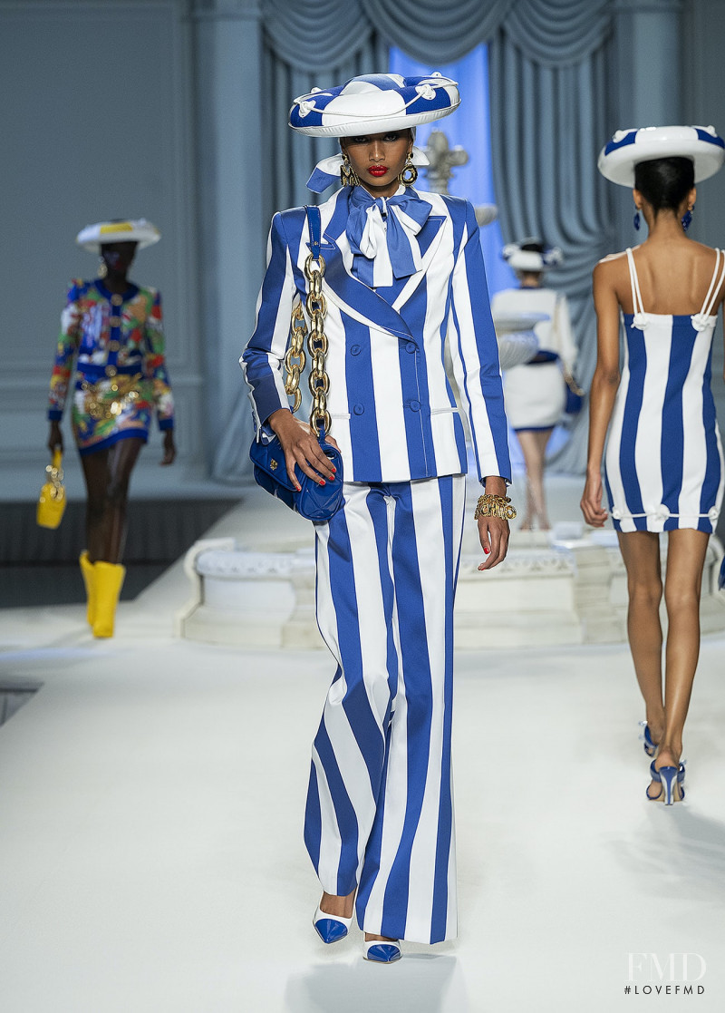 Ugbad Abdi featured in  the Moschino fashion show for Spring/Summer 2023