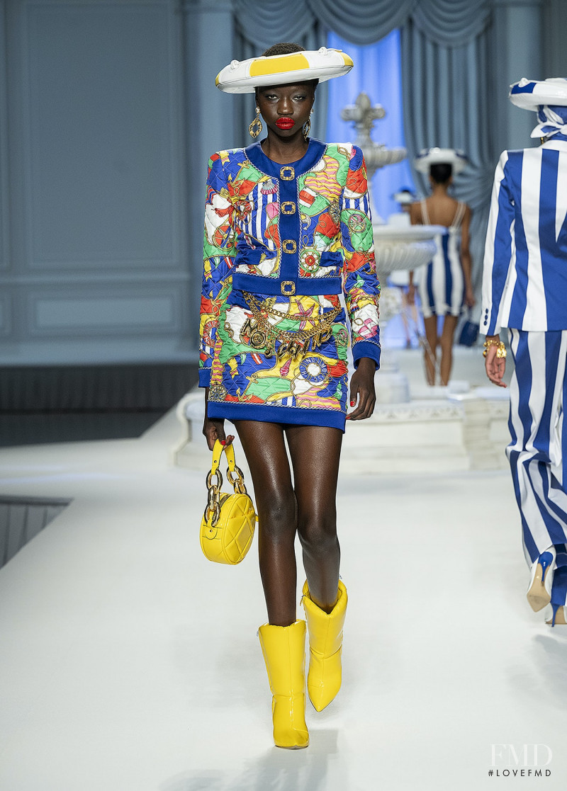 Anyiang Yak featured in  the Moschino fashion show for Spring/Summer 2023