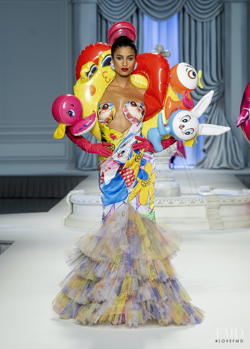 Imaan Hammam featured in  the Moschino fashion show for Spring/Summer 2023