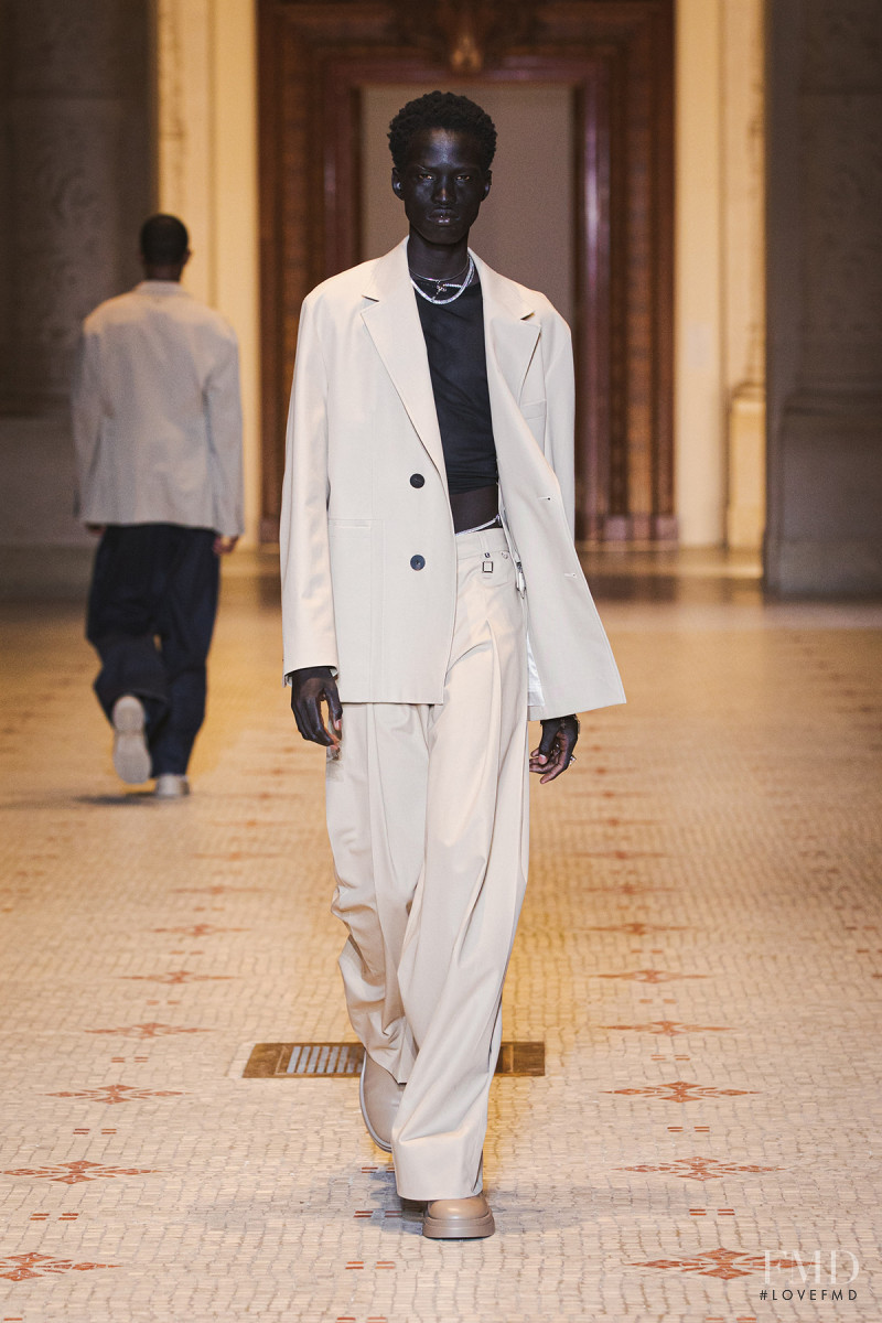 Mamuor Awak Majeng featured in  the Wooyoungmi fashion show for Spring/Summer 2023