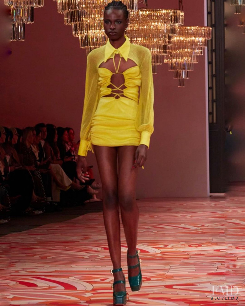 Bakhita Lual featured in  the Alice McCall fashion show for Resort 2022